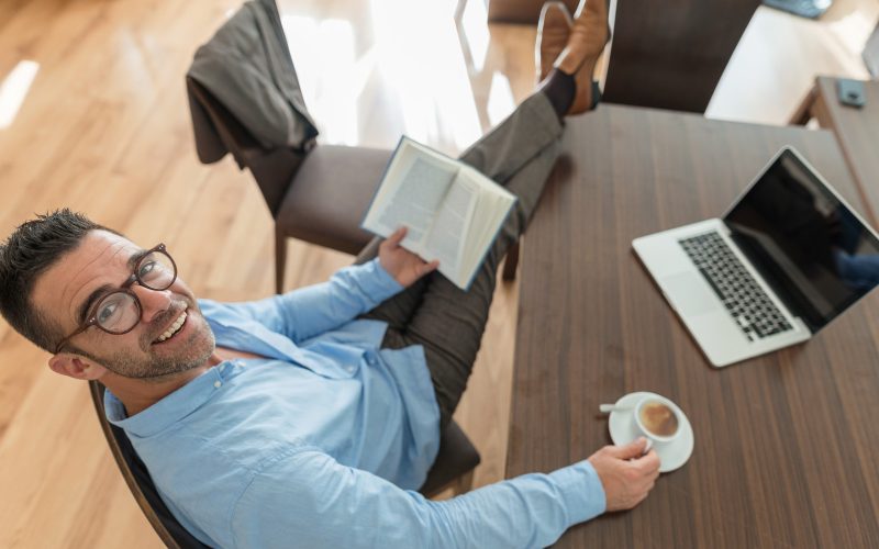 Businessman working from home during Covid-19 and taking a break